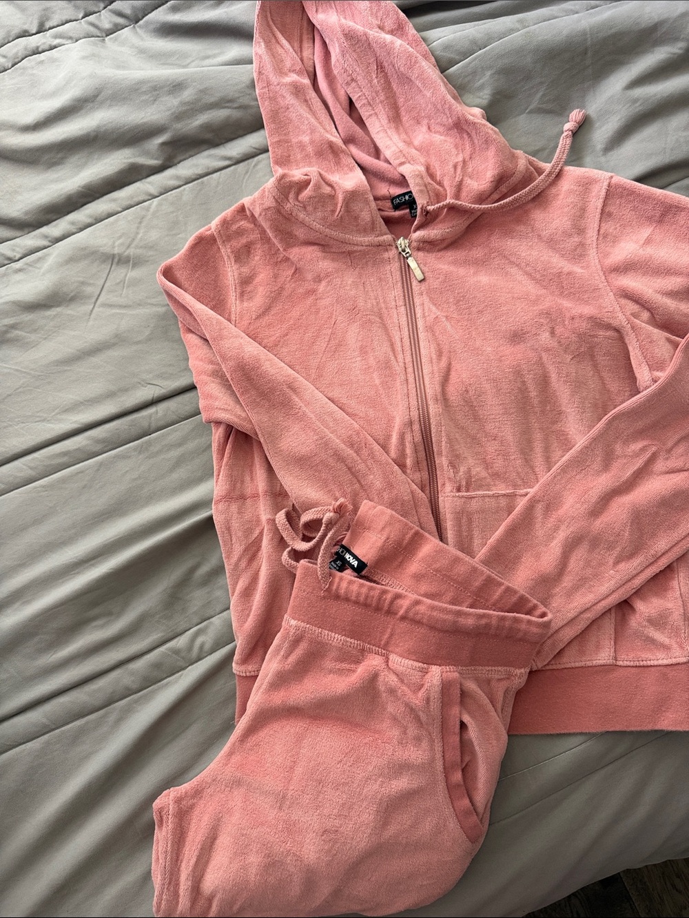 Pink track suit